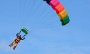 Colorful parachute over Interlaken, Swiss Alps, Clicktodo | انترلاكن فوق المظلة الملونة في جبال الألب